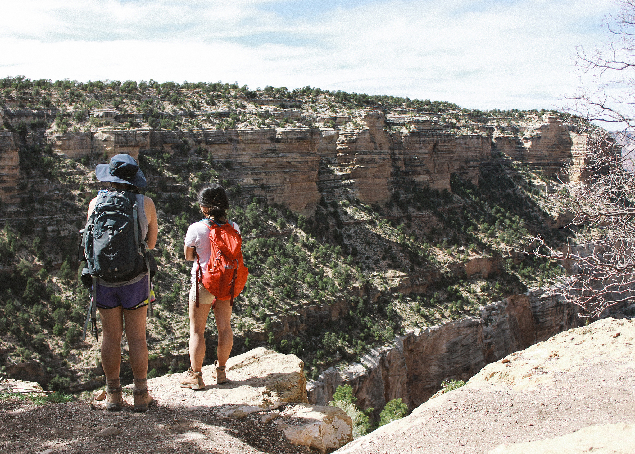 Vivian and Jennifer standing at the trailhead of the Bright Angel Trail