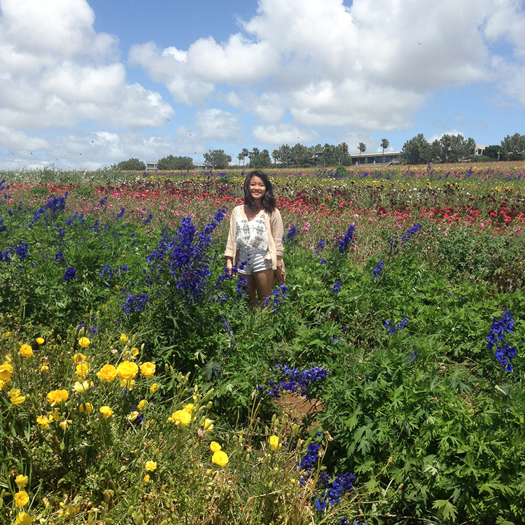 Jennifer in a field of flowers