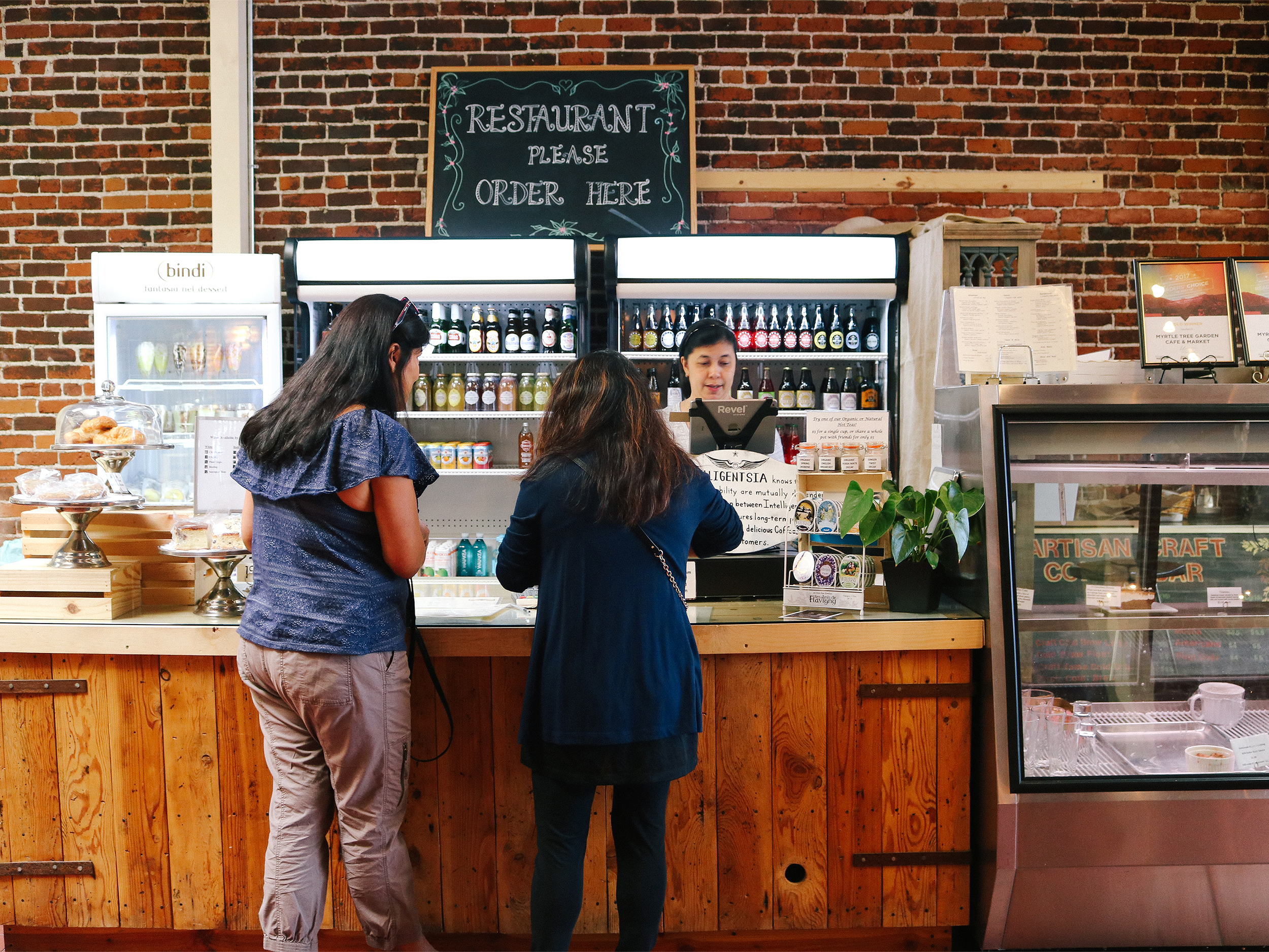 customers ordering food at the counter
