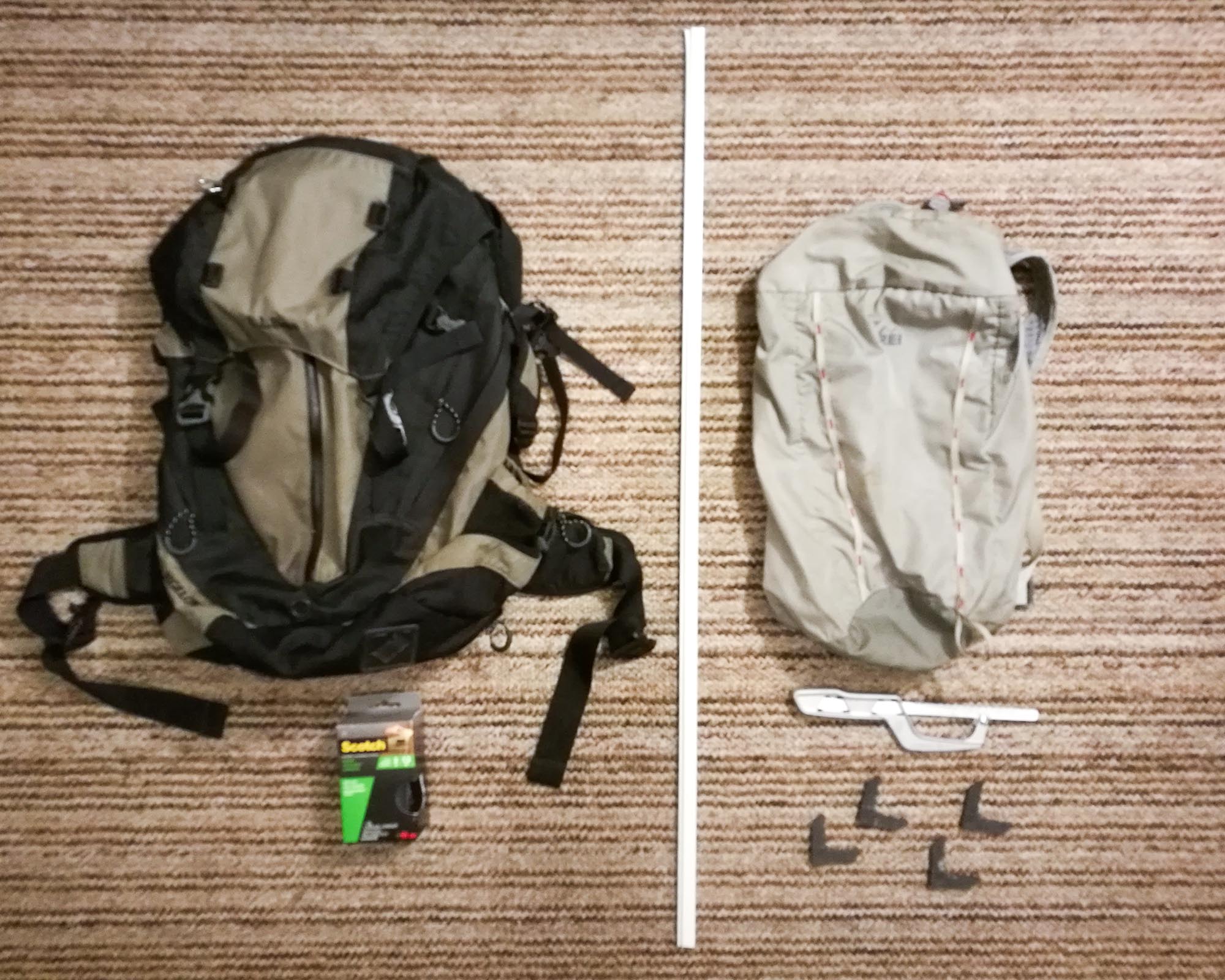 Photo of materials: LL Bean 27L Daypack for hip belt, roll of velcro, frame, REI 18L Flash Pack, metal handsaw, and frame connectors