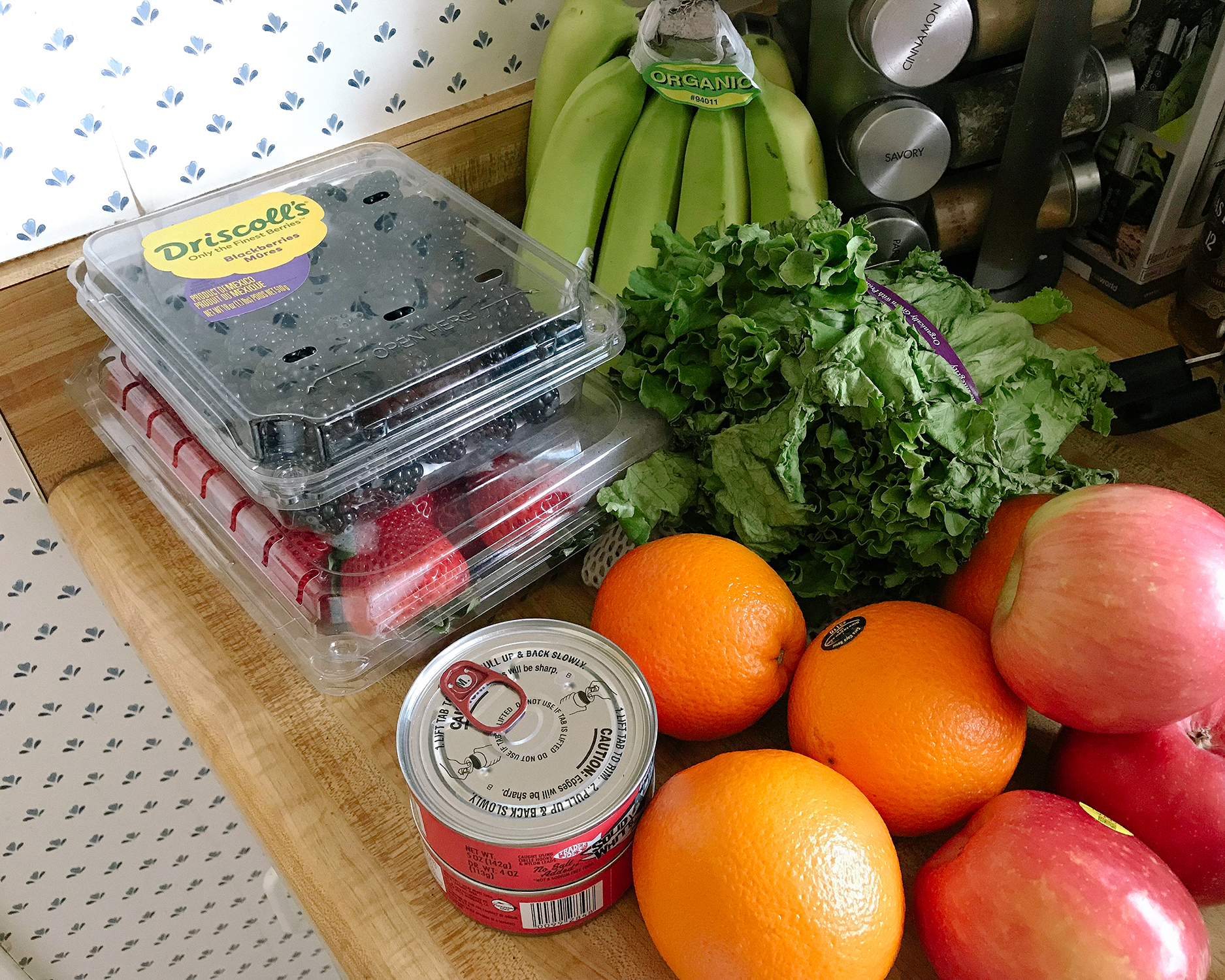 Photo of my grocery for the week: fruits, veggies, and a tuna can