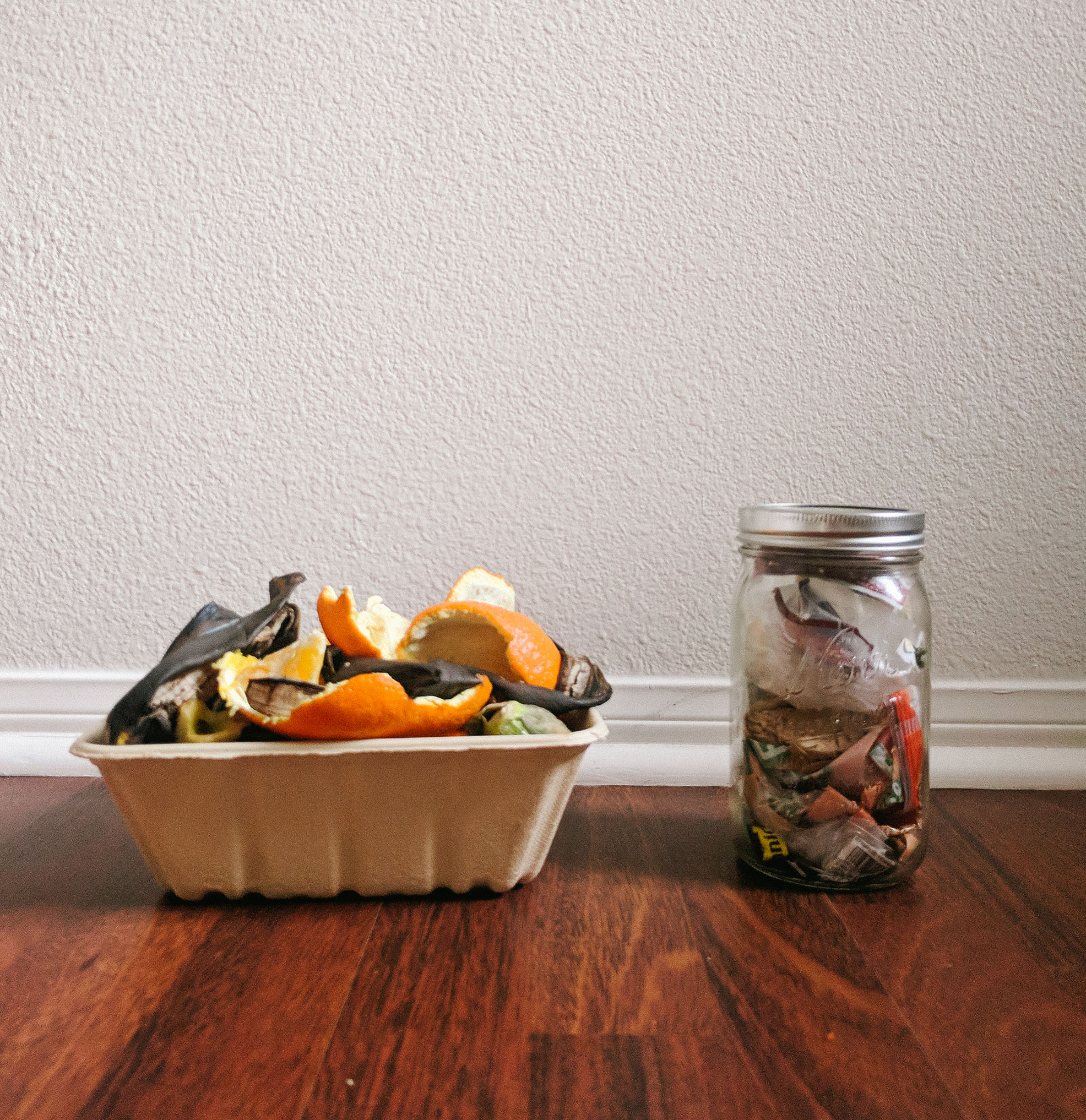 mason jar with waste and compost pile day 6