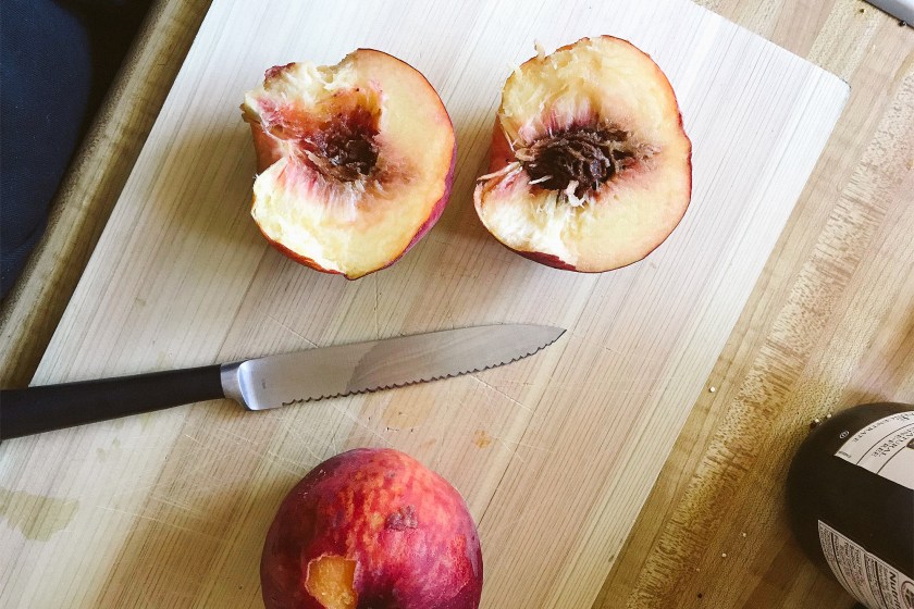 Peaches on a cutting board
