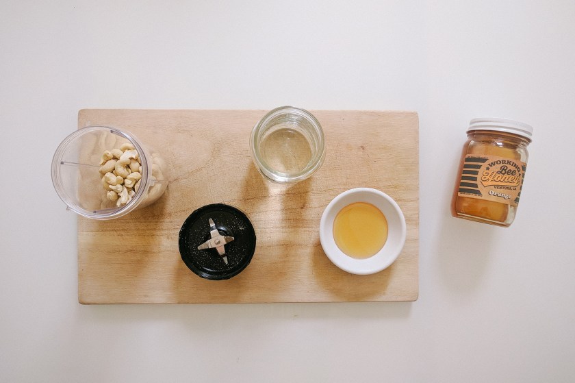 Cover Photo of cashews, water, and honey to make cashew milk